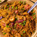 DALL·E 2023-05-11 11.00.20 - An overhead photo of jambalaya at a food festival in Food Network Magazine.