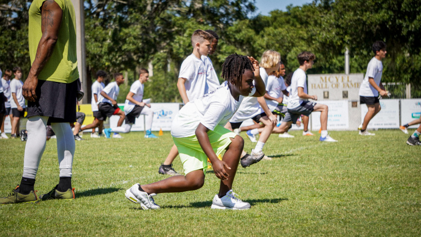 Young-athletes-taking-part-in-stretches-ahead-of-drills-at-the-Jaydon-Hodge-More-Than-An-Athlete-Football-Camp..jpg