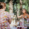 free-photo-of-women-buying-cosmetics-from-stand-among-trees