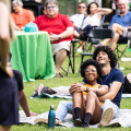 Younger-couple-cuddling-and-laughing--scaled