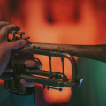 free-photo-of-a-person-playing-a-trumpet-in-front-of-a-green-screen