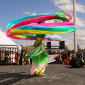 free-photo-of-audience-looking-at-a-woman-in-a-colorful-costume-dancing-on-stage