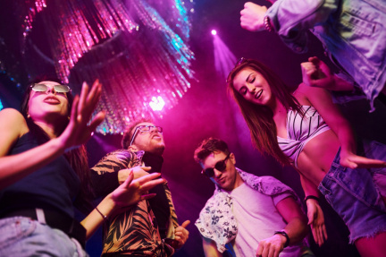 view-from-below-of-young-people-that-having-fun-in-night-club-with-colorful-laser-lights-1