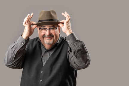 JPG-Grabbing-Hat-with-Two-hands-scaled