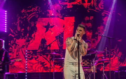 Dan Budd as Robbie Williams