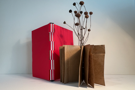Bookbinding-Piano-Hinge-Happenings-an-example-of-a-piano-hinge-bound-notebook-on-a-blank-white-background