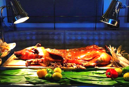 LECHON EN EL MALECON
