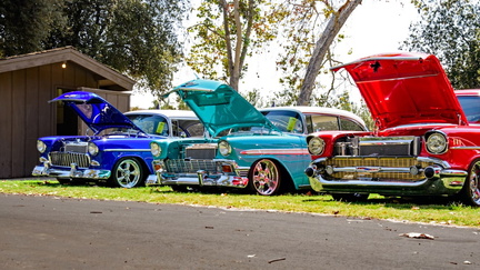 unsplash photos three-red-blue-and-teal-classic-cars