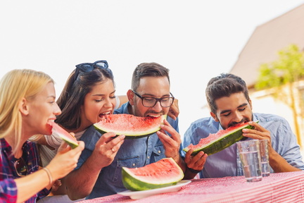 friends-eating-watermelon-slices-2023-11-27-05-13-11-utc