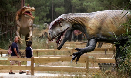 78000392_People-visit-the-Dino-Park-an-outdoor-museum-with-more-than-120-models-of-dinosaurs-in-Lour