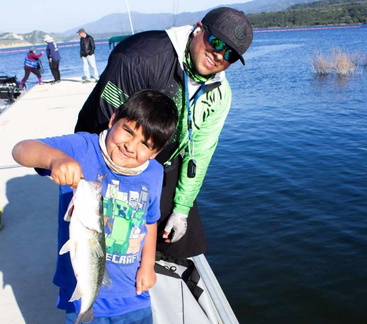 kid-holding-fish
