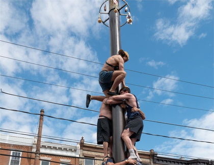 Italian Market Festival Grease Pole Climbing Competition